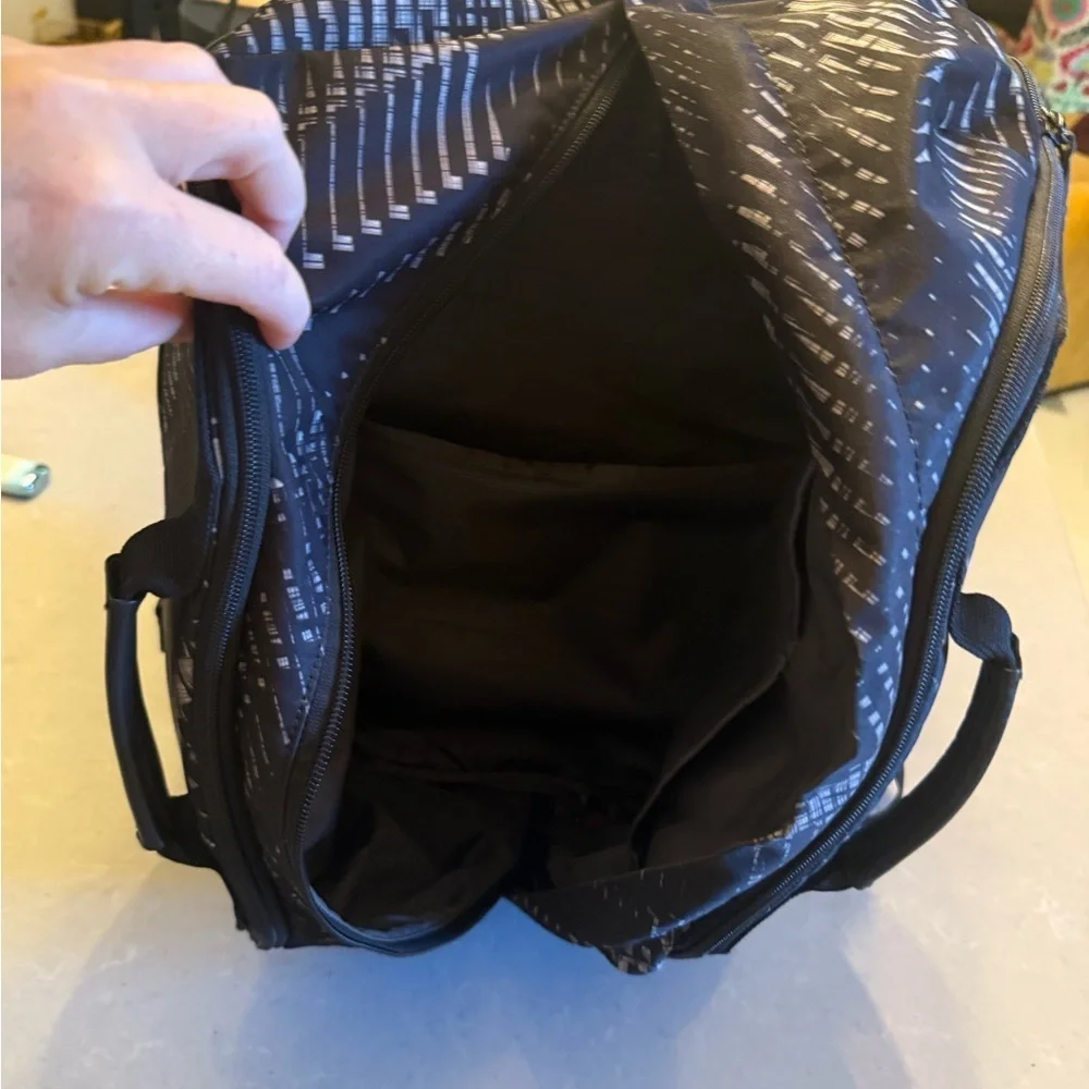 Tumi Black and Gray Patterned Duffel Backpack